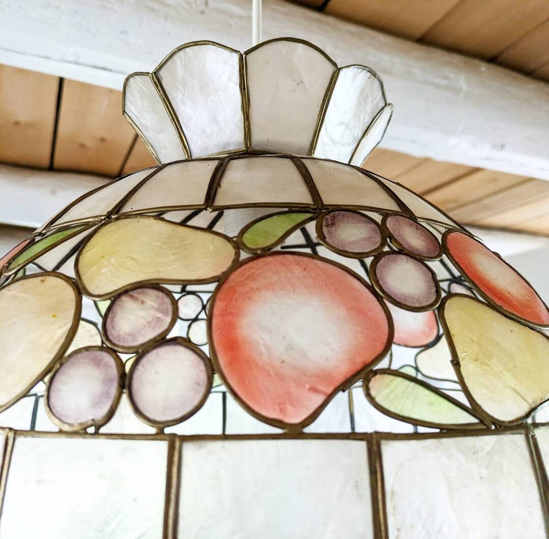 Vintage mother-of-pearl and brass pendant light.