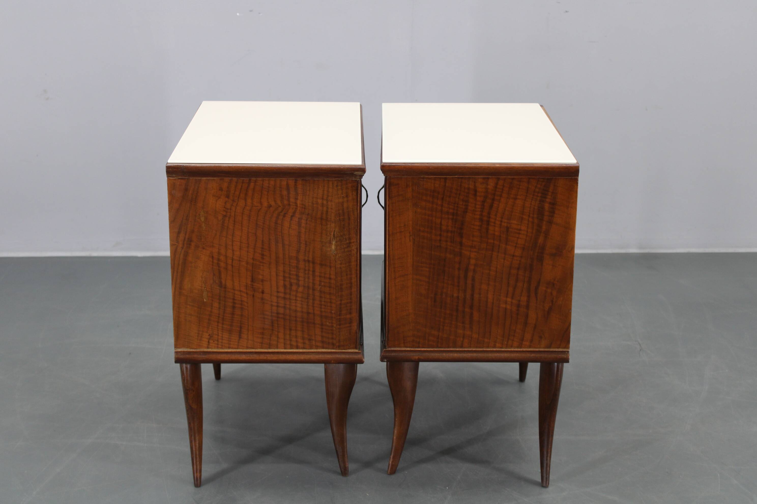 Pair of mid-century Italian walnut nightstands with glass top, 1950s