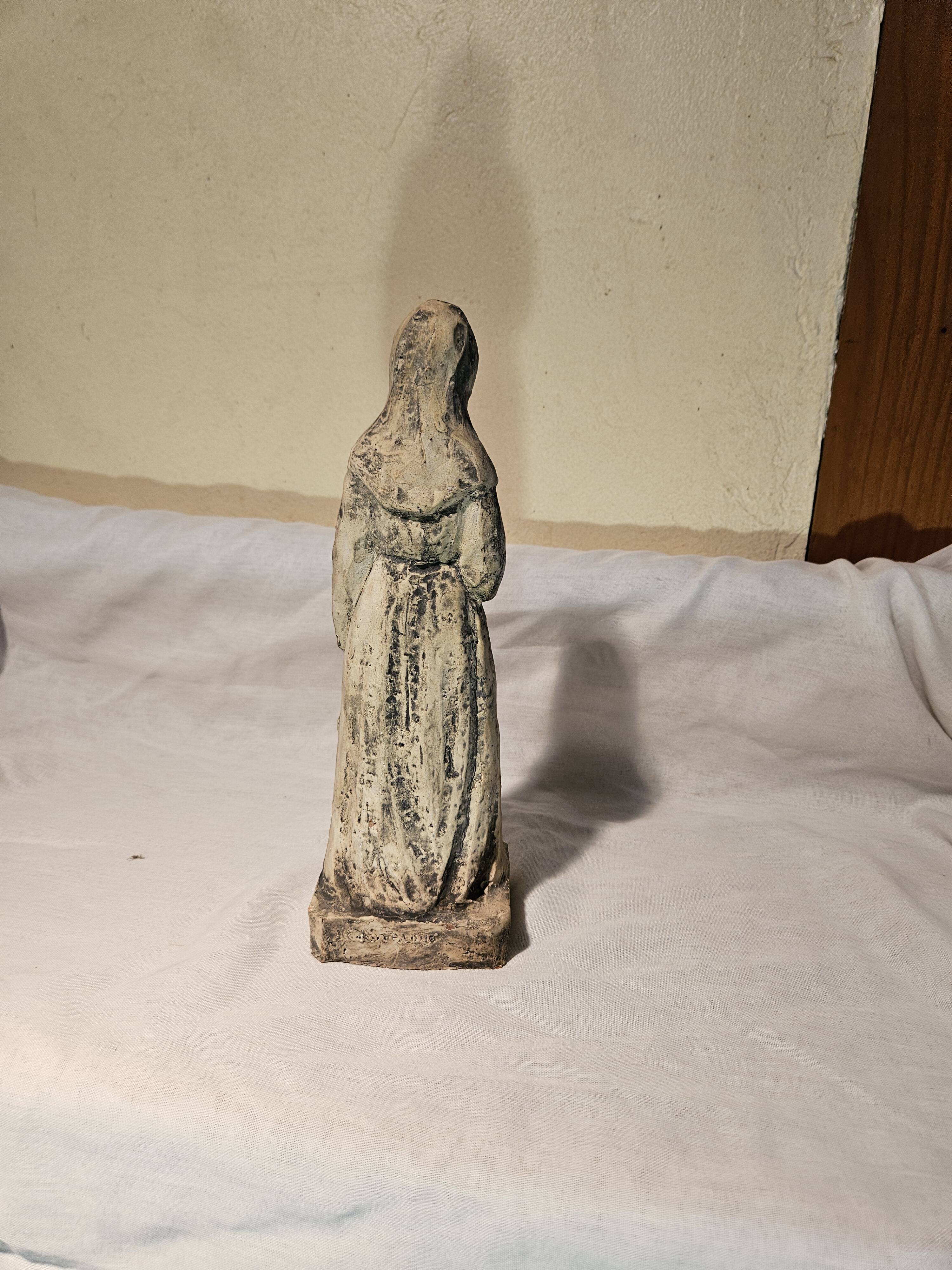 Painted terracotta holy virgin statue