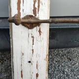 antique coat rack with 4 cast iron hooks