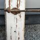 antique coat rack with 4 cast iron hooks