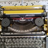 Vintage yellow portable typewriter, working, AEG, new ribbon