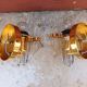 Pair of wall sconces in crystal glass and gilded brass. Venini style.