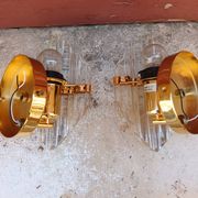 Pair of wall sconces in crystal glass and gilded brass. Venini style.