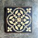 Wooden trivet and cement tiles, 1880