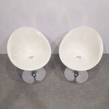 Two Kartell Eros chairs