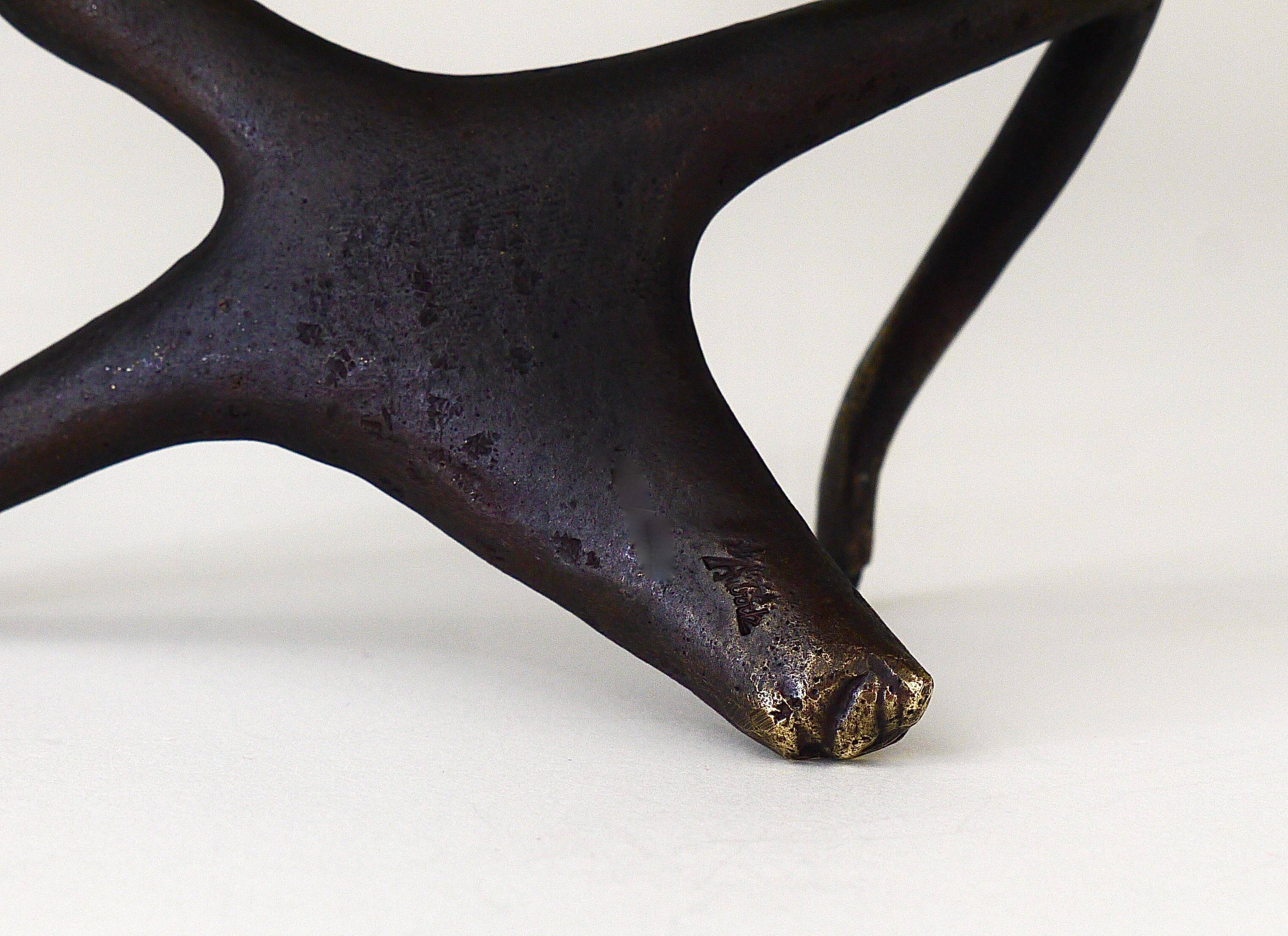 Handmade brass sculpture by Carl Auböck, Optimist Pessimist, model no. 4059.