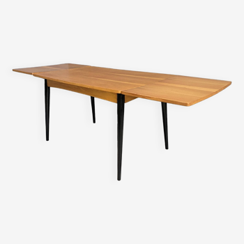 Wood enlarging dining table black wood legs 1960s
