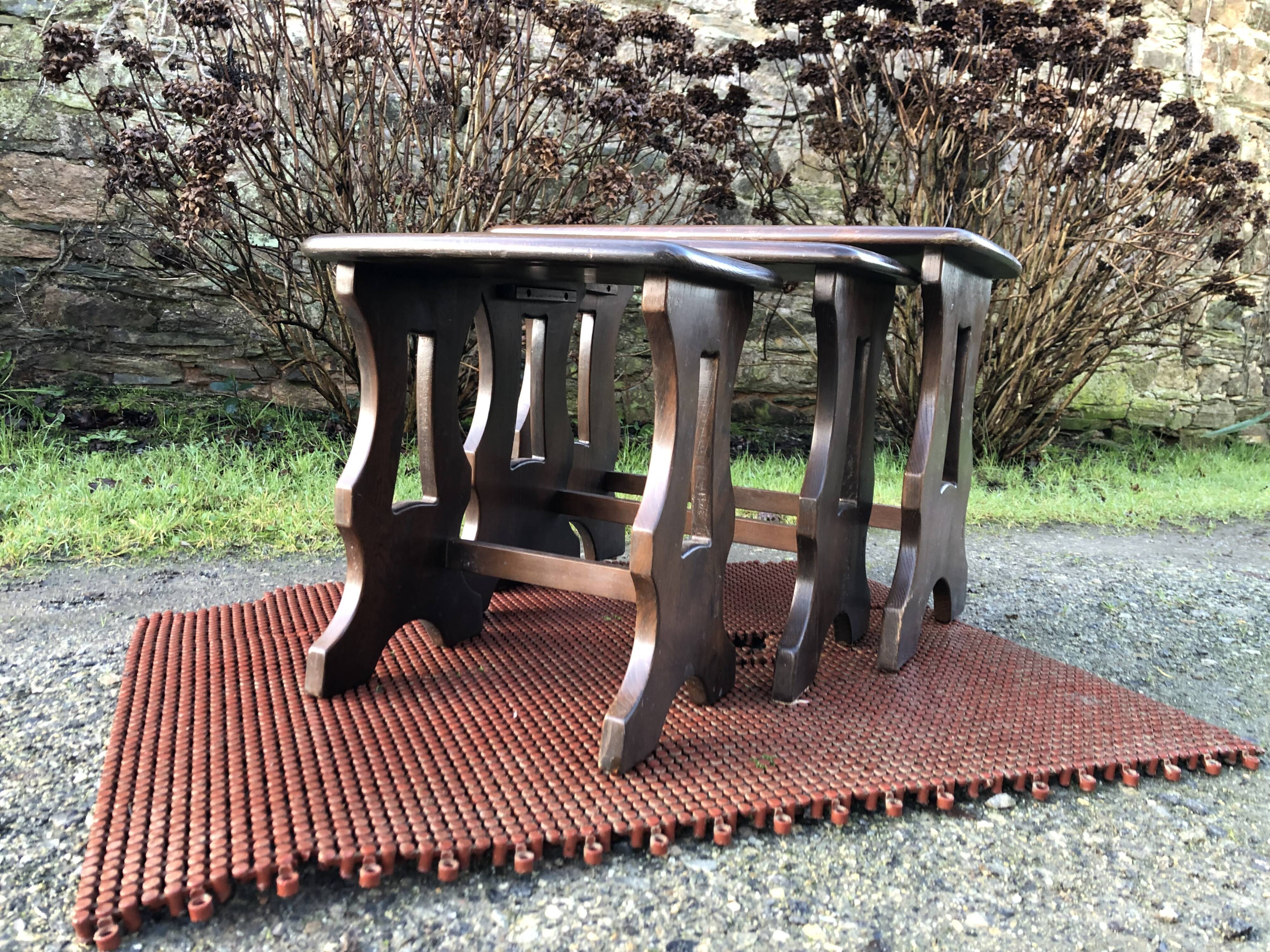 Vintage English nesting tables in elm.