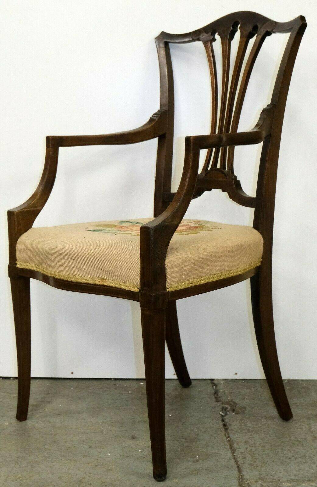 Hepplewhite armchair in hardwood on delicate legs with original seat.