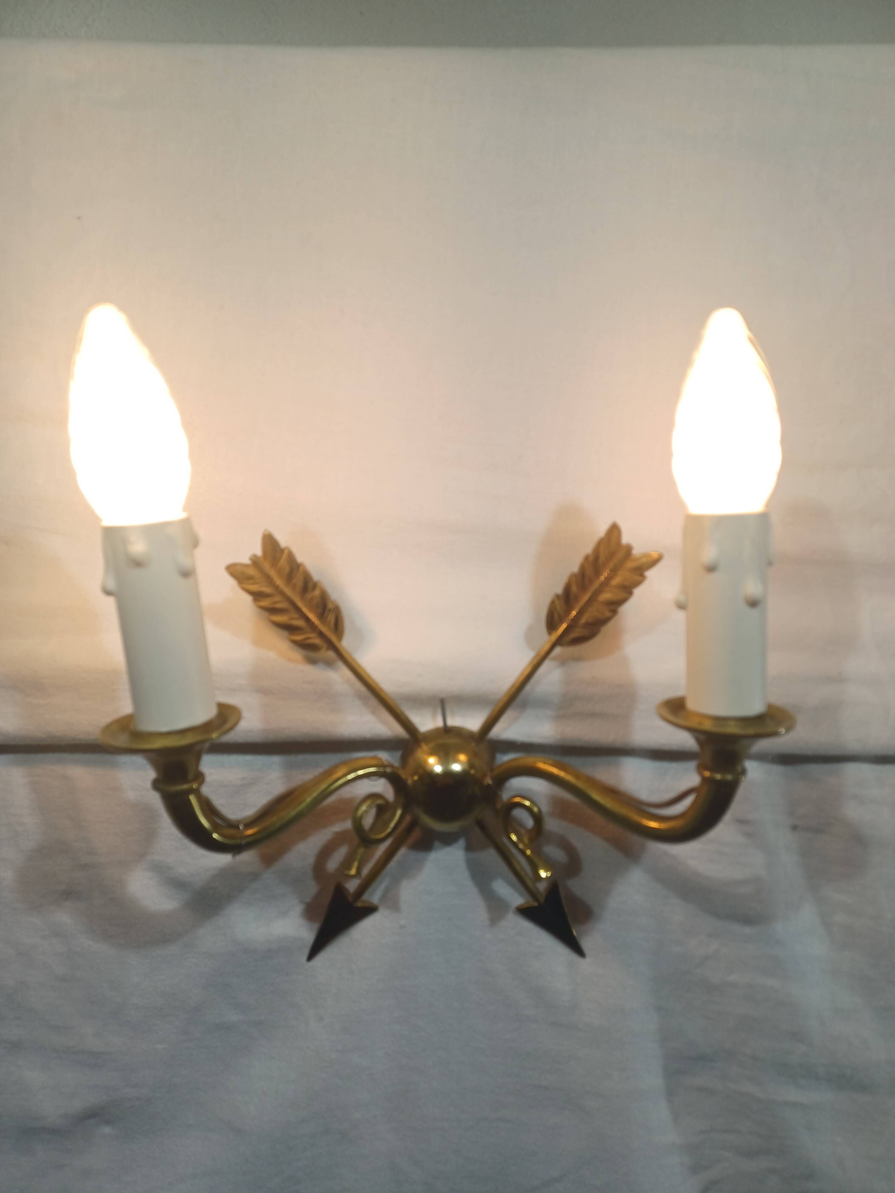 Empire style arrow wall light