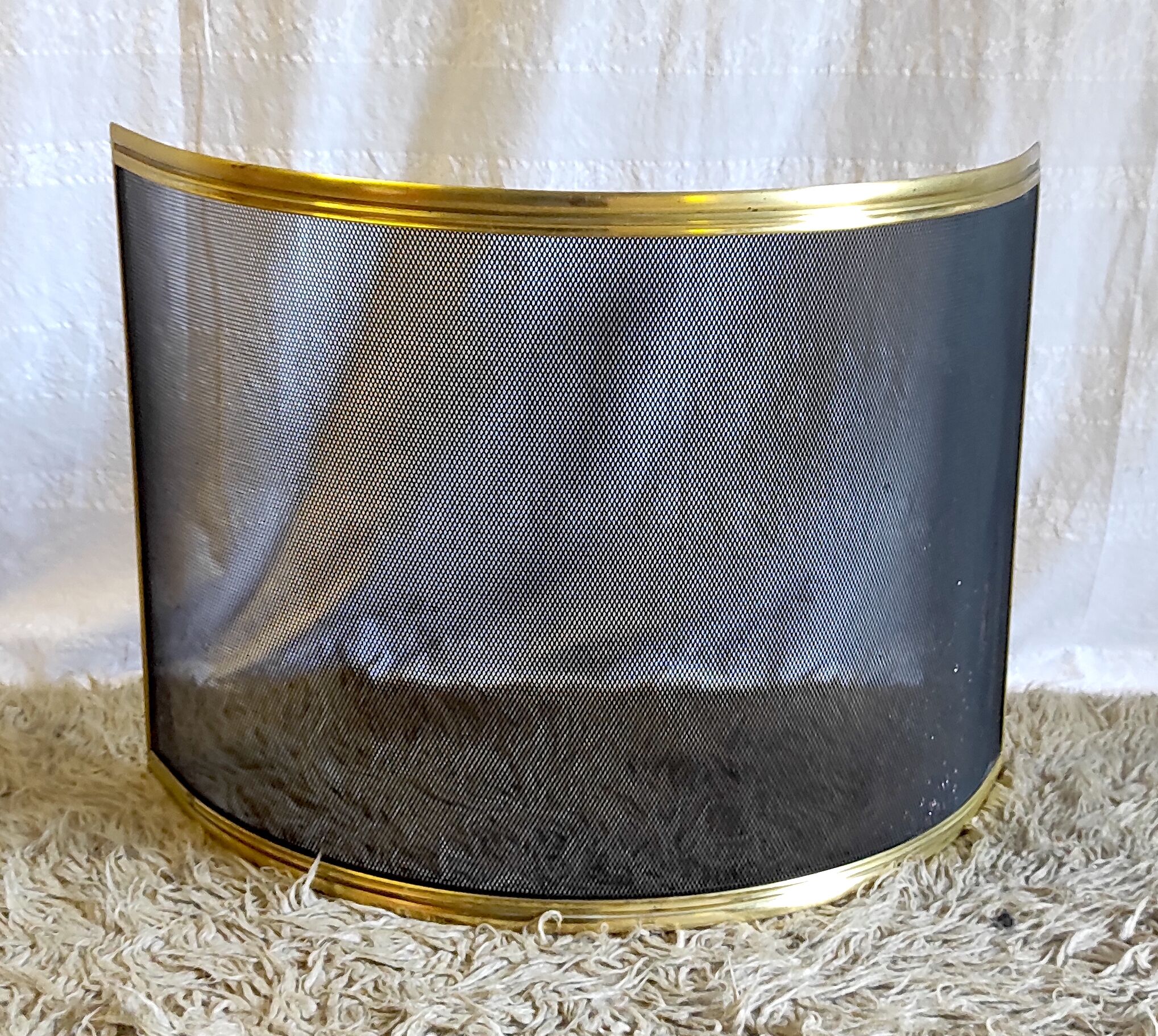 Brass bow firewall and metal mesh