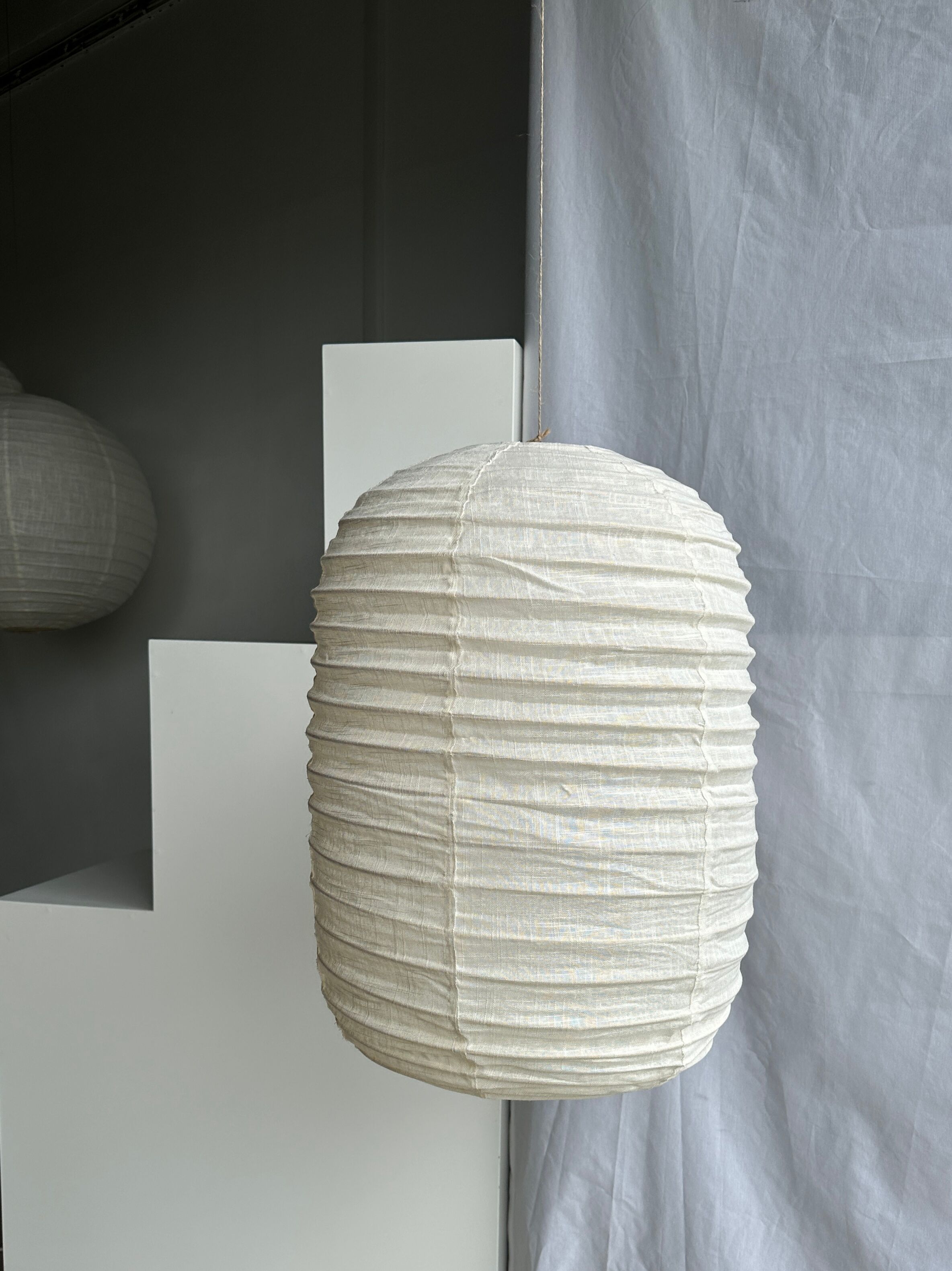 Suspension in rattan and natural japanese linen lantern shape h70 d50