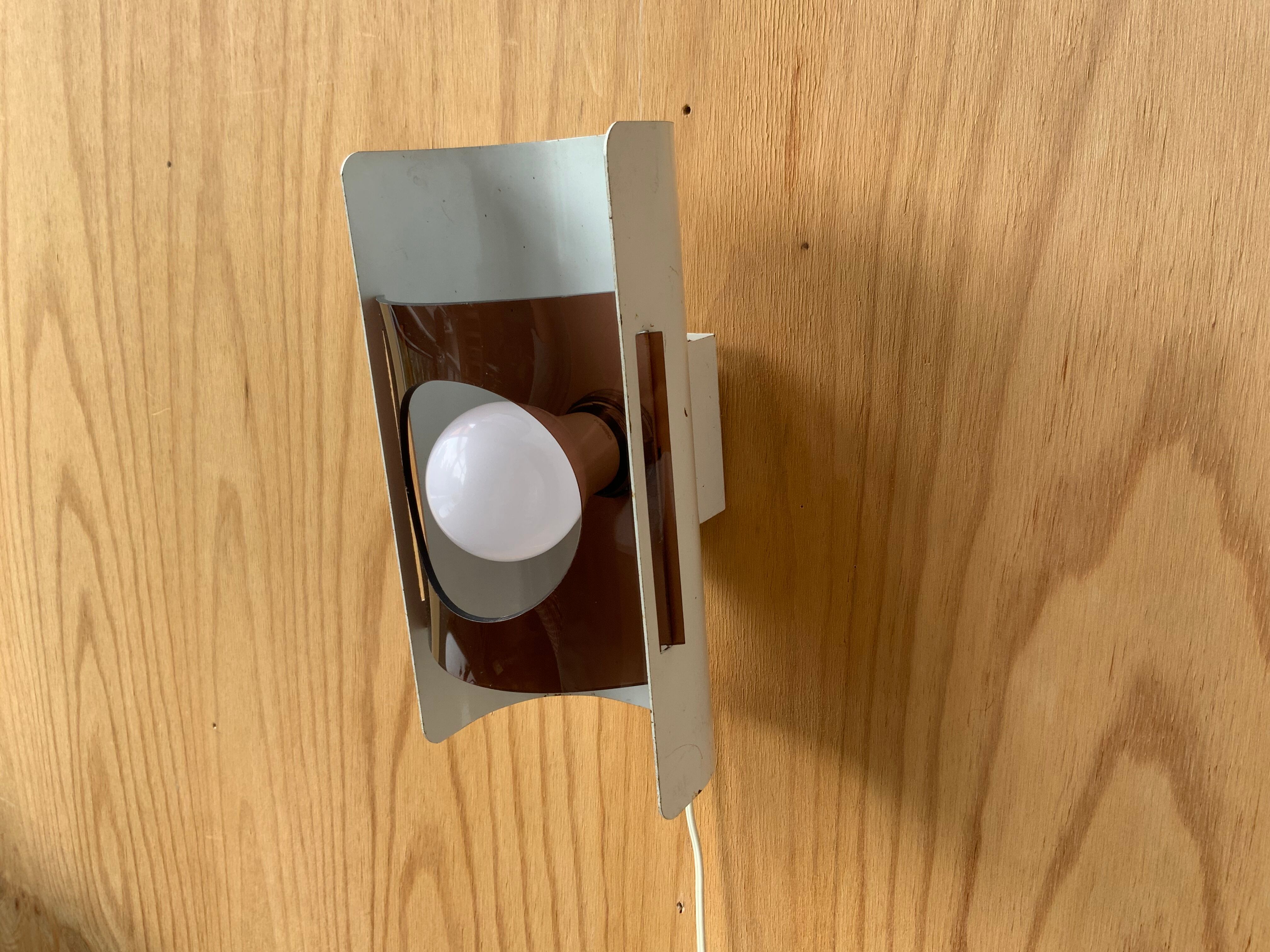 Plexiglas and metal wall lamp