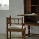 Antique French corner chair handcrafted with lamb's wool, early 20th century.