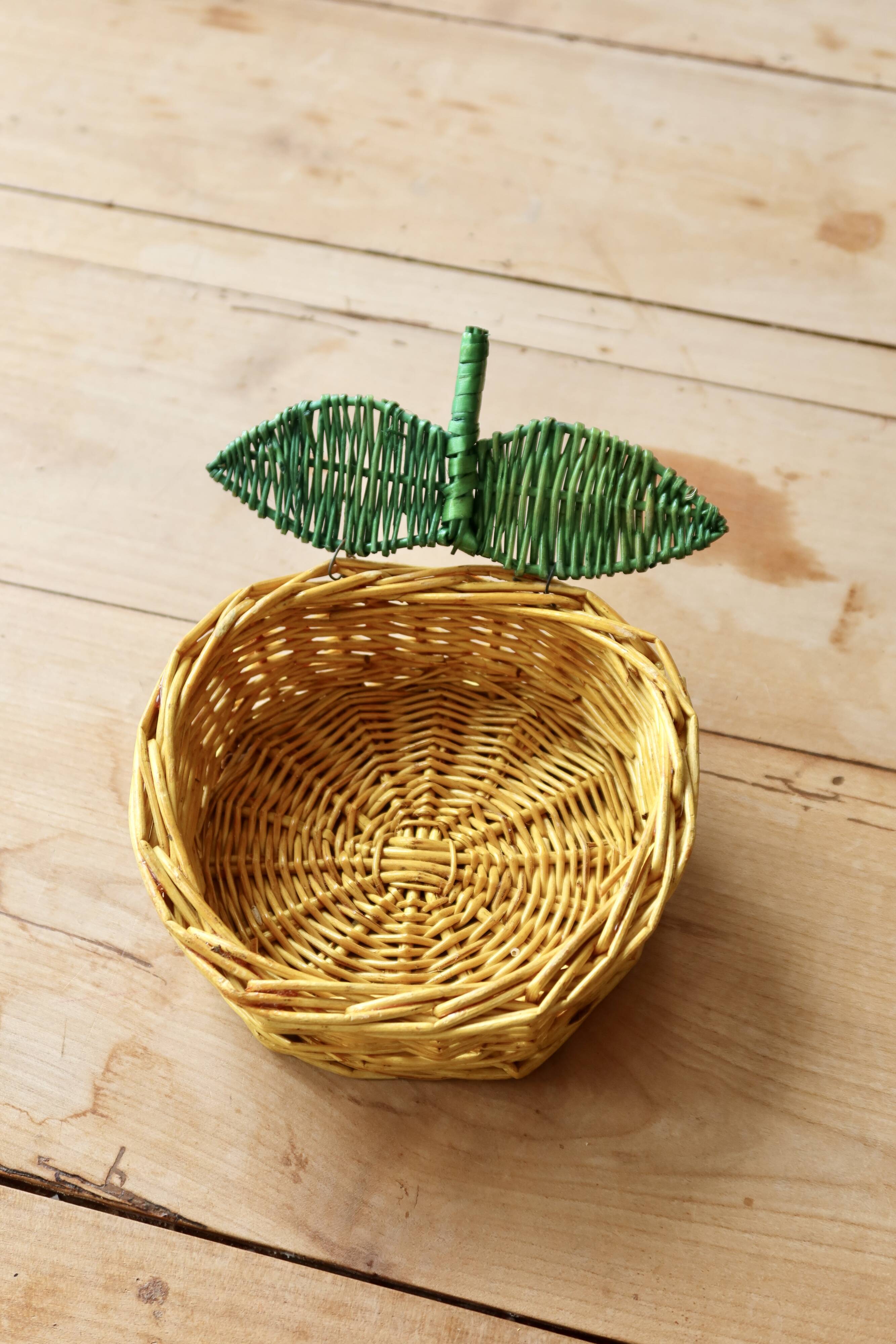 Small vintage wicker baskets in the shape of orange and lemon fruit
