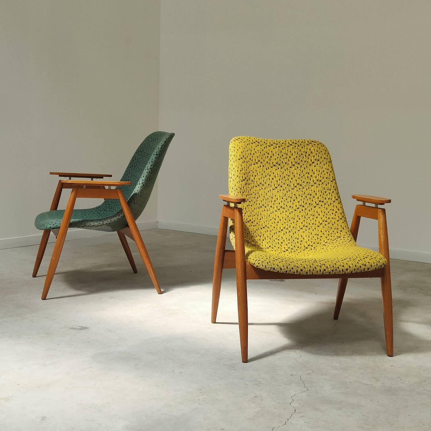 Pair of yellow and green resin and wood armchairs by Miroslav Navratil