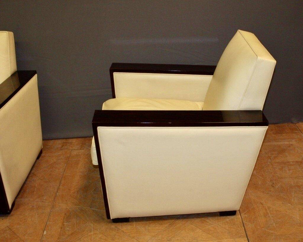 Pair of art deco armchairs in rosewood and beige leather