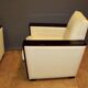 Paire de fauteuils art deco en palissandre et cuir beige