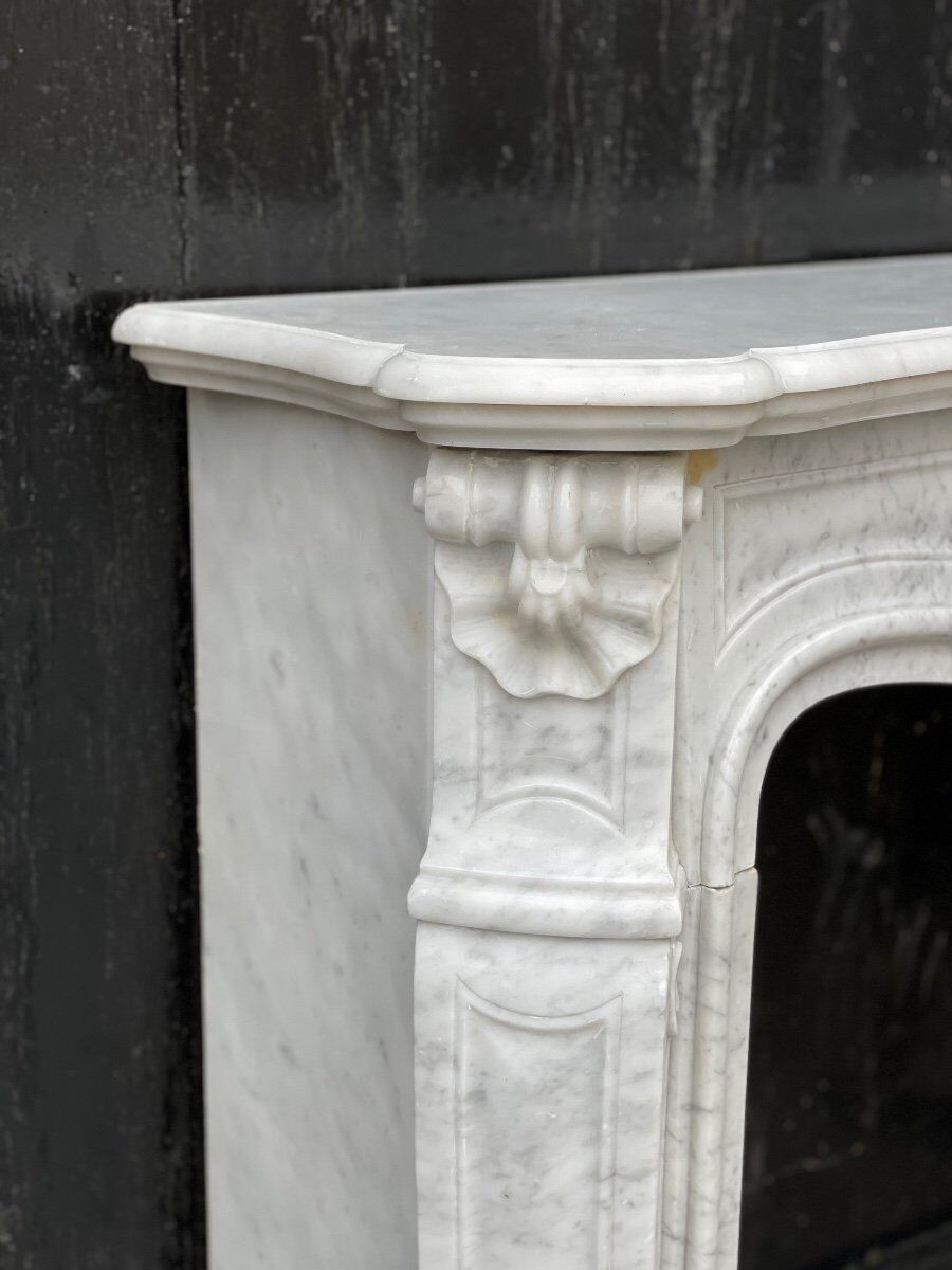 Louis XV style fireplace in Carrara marble