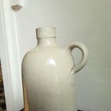 Vintage glazed stoneware bottle with handle