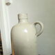 Vintage glazed stoneware bottle with handle