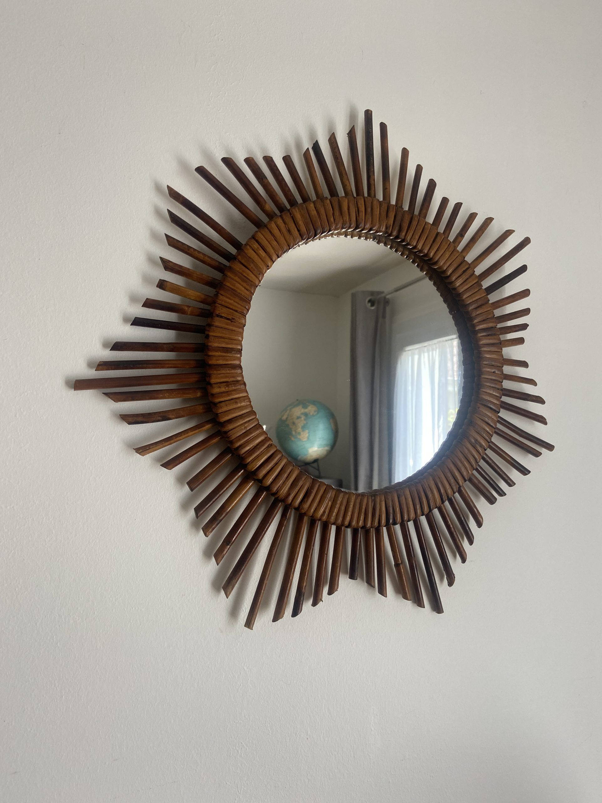 Vintage rattan sun mirror