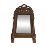 Miroir de style Louis XVI en bois patiné et doré