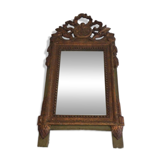 Louis XVI style mirror in patinated and gilded wood
