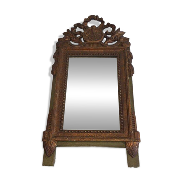 Louis XVI style mirror in patinated and gilded wood