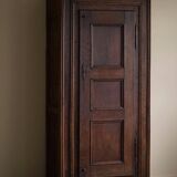 Tall antique oak wardrobe, made by a French cabinetmaker, late 19th century.