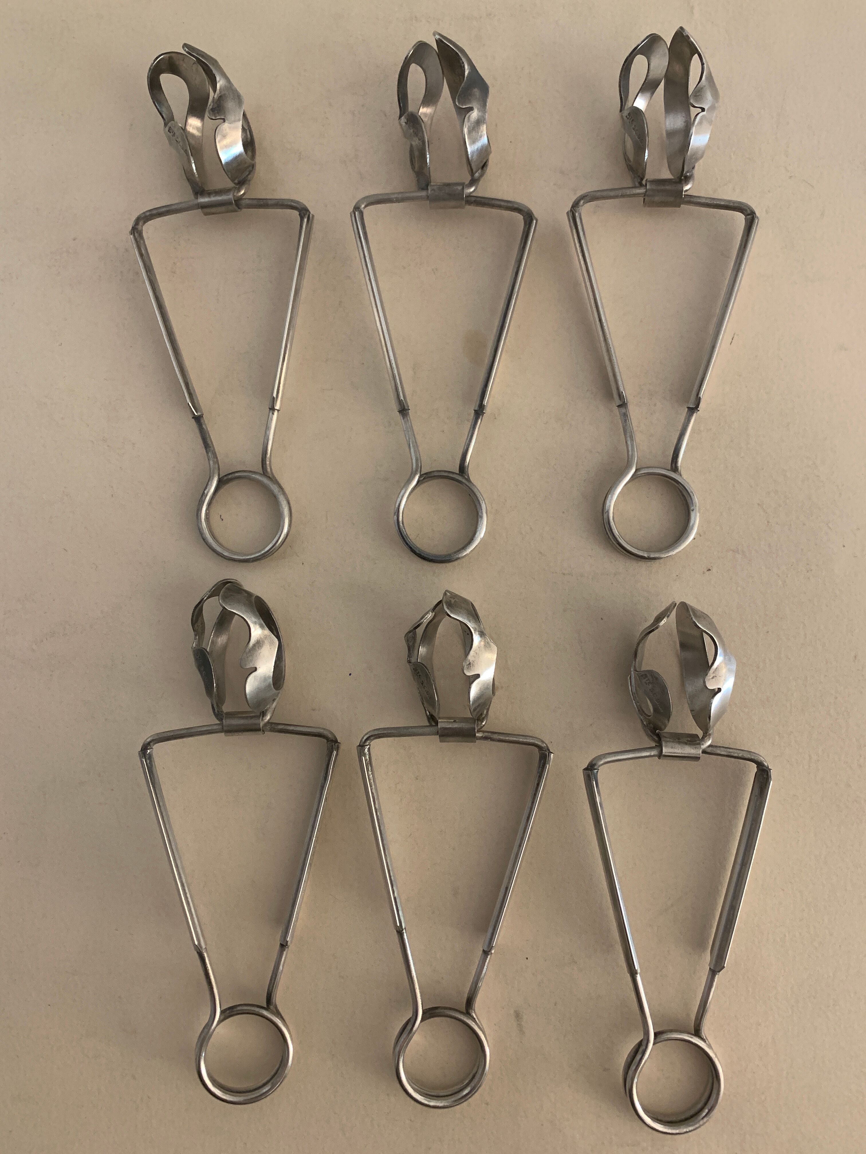 6 silver metal snail clips in their original box