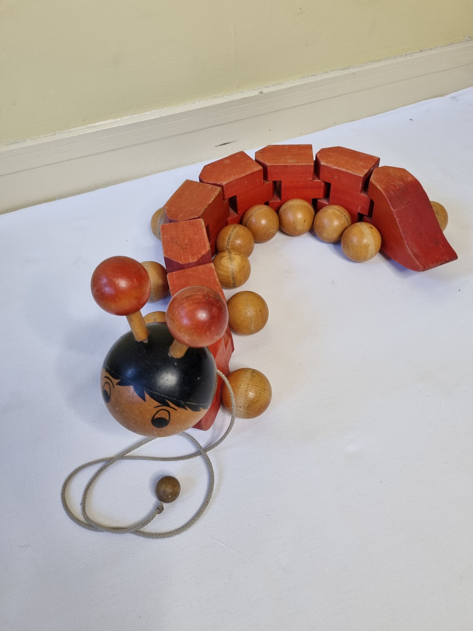 Vintage pulling toy, "centipede", 82 cm, made in Switzerland