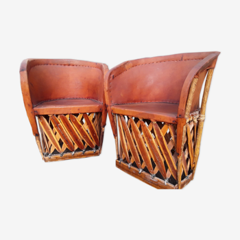 Deux fauteuils mexicains bois et cuir appelés "equipales" fabriqués artisanalement