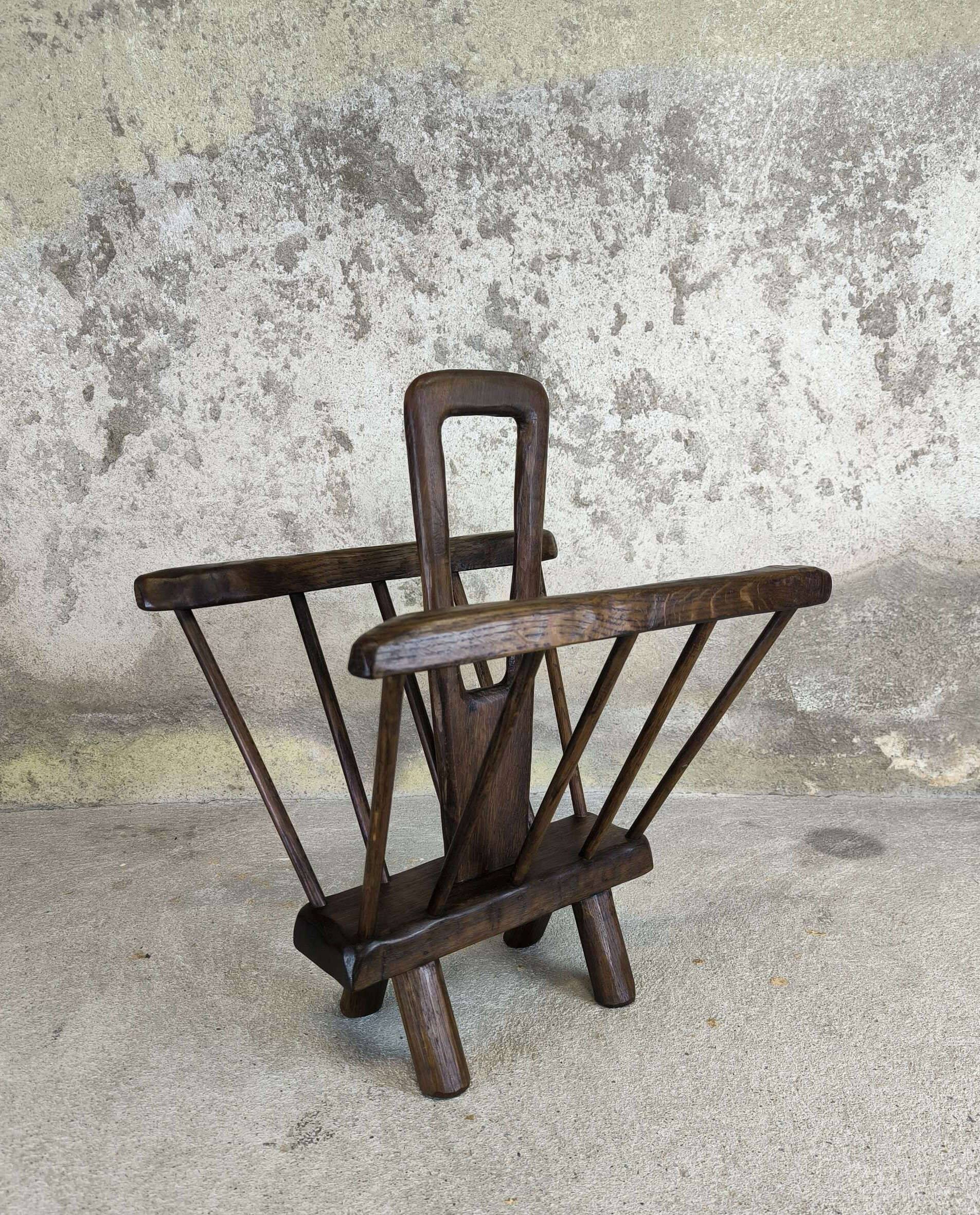 Vintage magazine rack in solid wood.