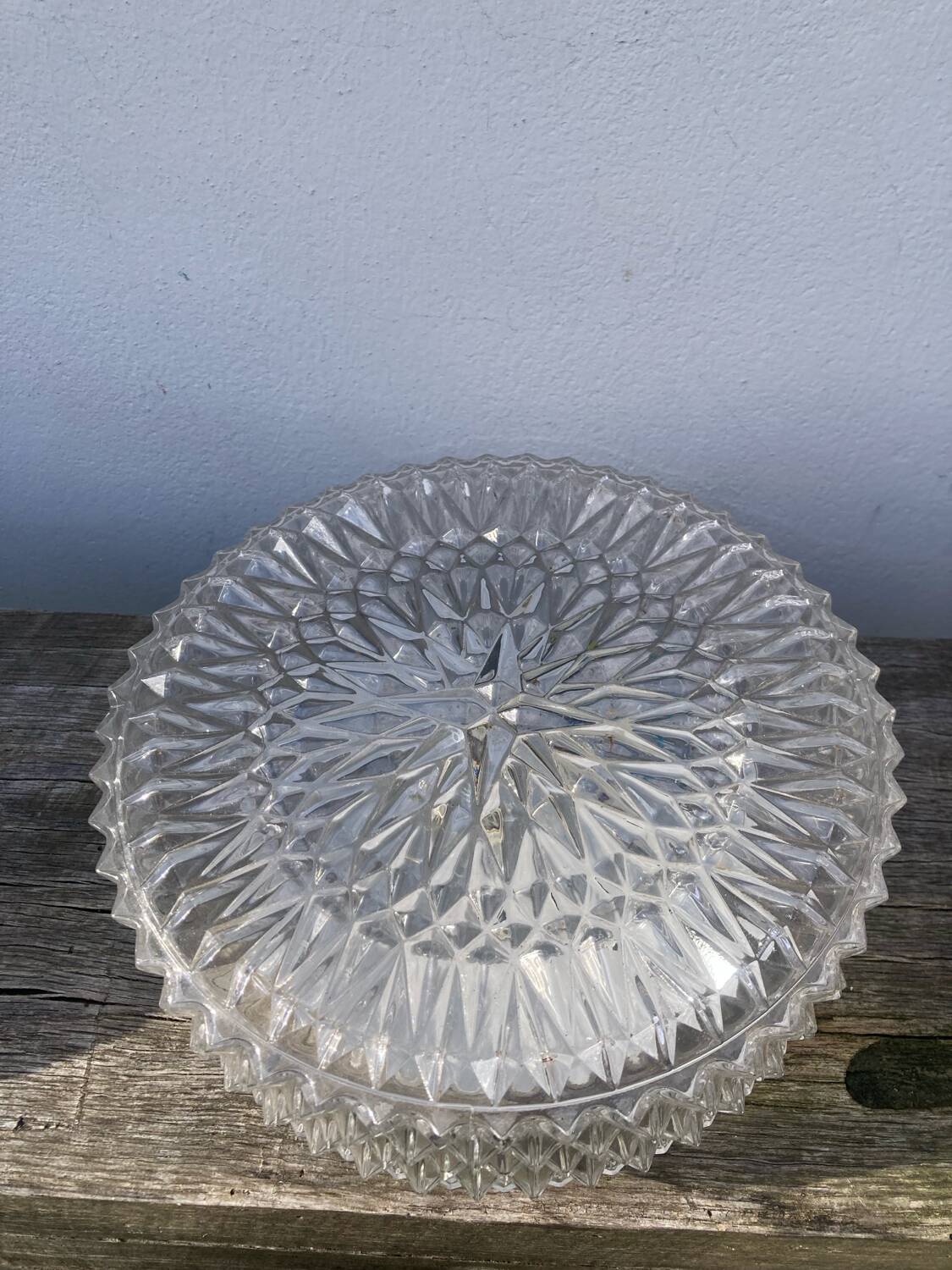 Pair of transparent round glass wall lights