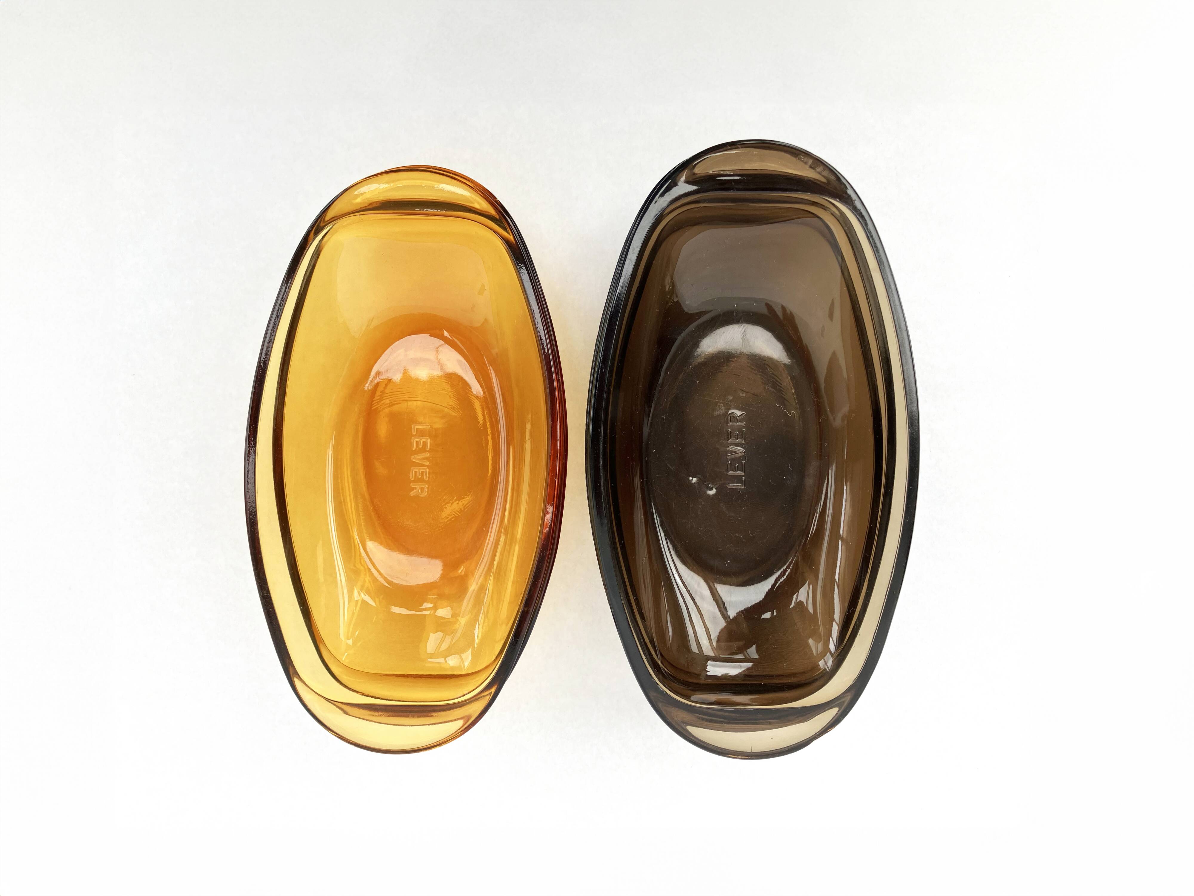 Set of 5 small oval eared dishes in amber and smoked tempered glass
