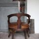 Barber chair in wood and leather with adjustable headrest, office chair.