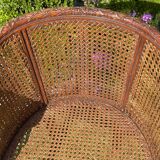 Fauteuil en bois fruitier et cannage style Louis XVl