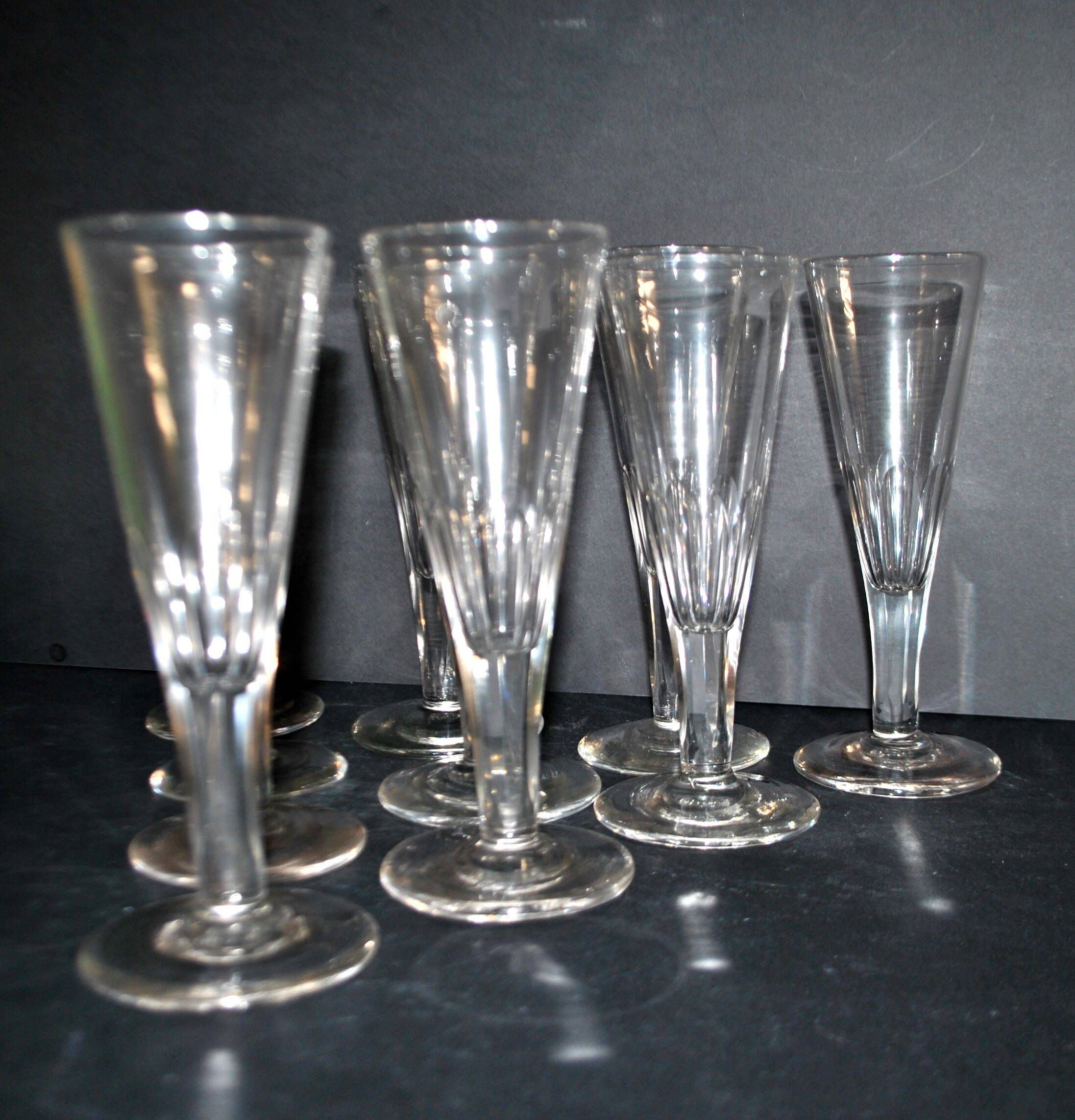 Portieux? Meisenthal? Set of 10 cut glass champagne flutes with flat sides from 1900.