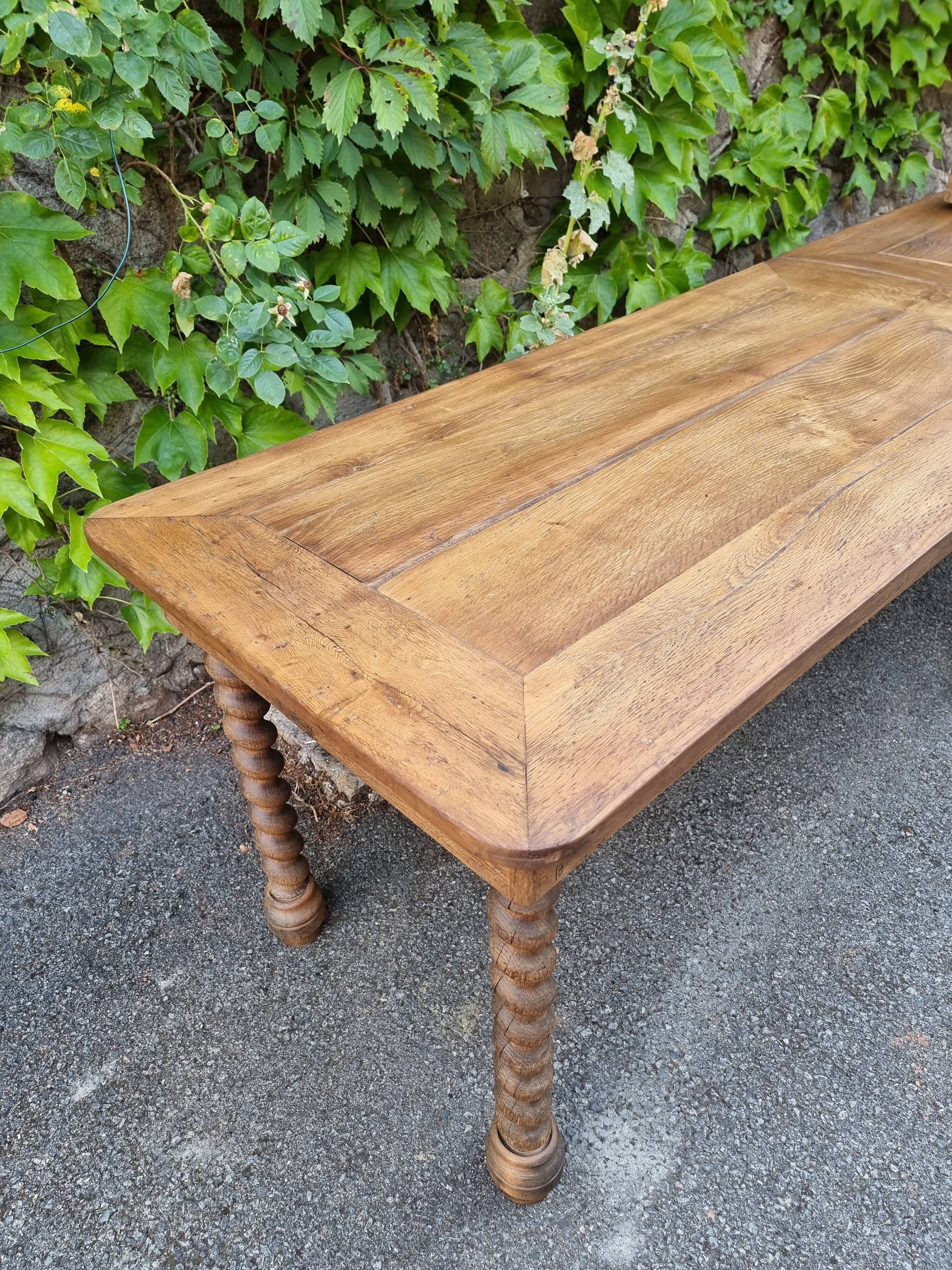 Antique French draper's table in oak, shop counter, work table, 6 feet, circa 1750–1850.