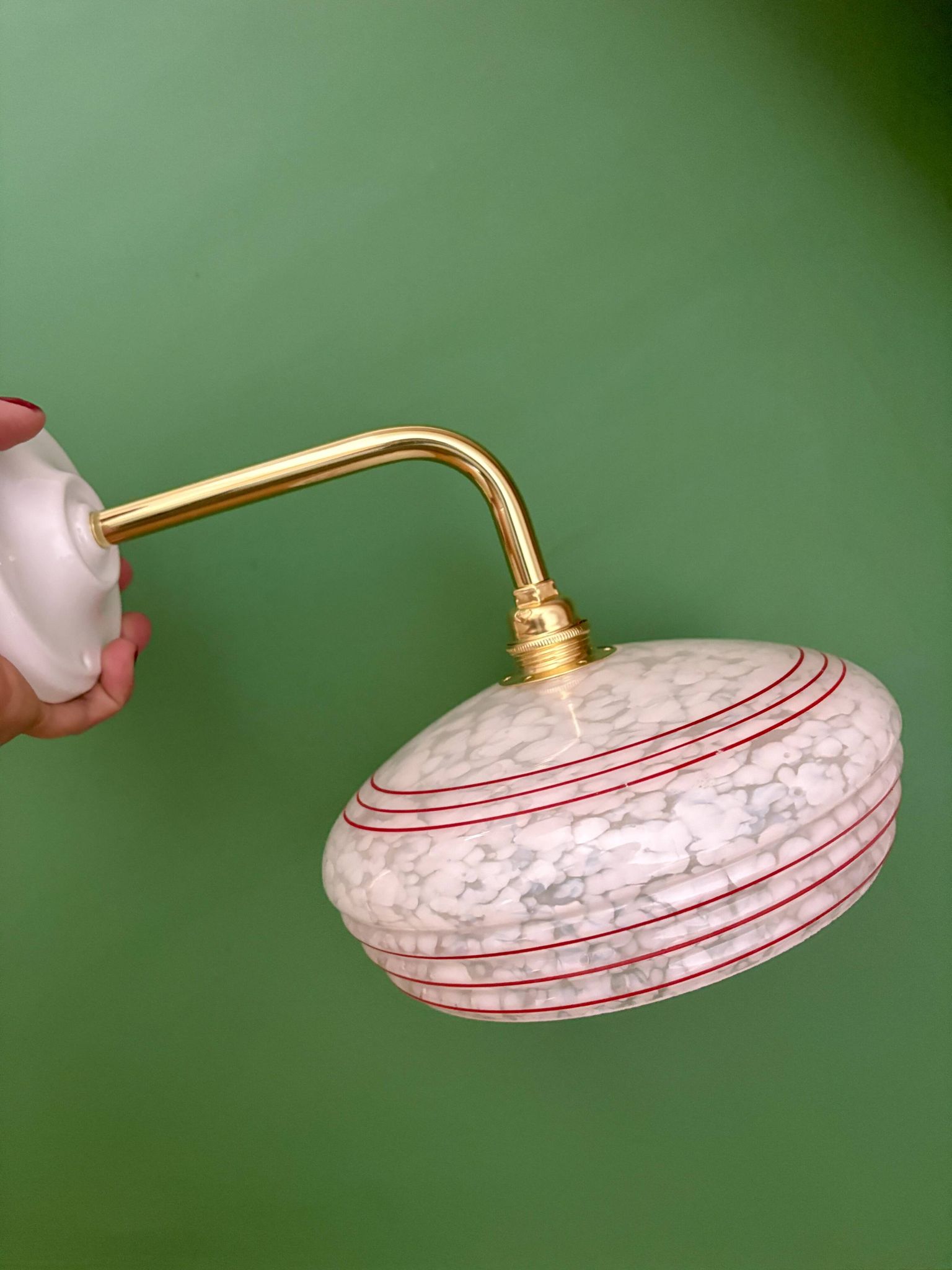 Vintage angled wall lamp with white clichy glass shade and red edging