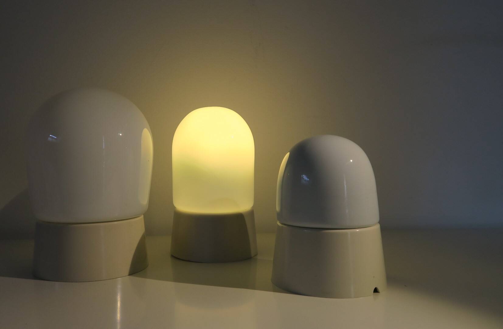three wall sconces/ceiling lights, 1950s. Glass and Bakelite