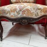 Paire de fauteuils style régence