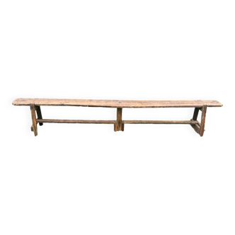 Large old farm bench