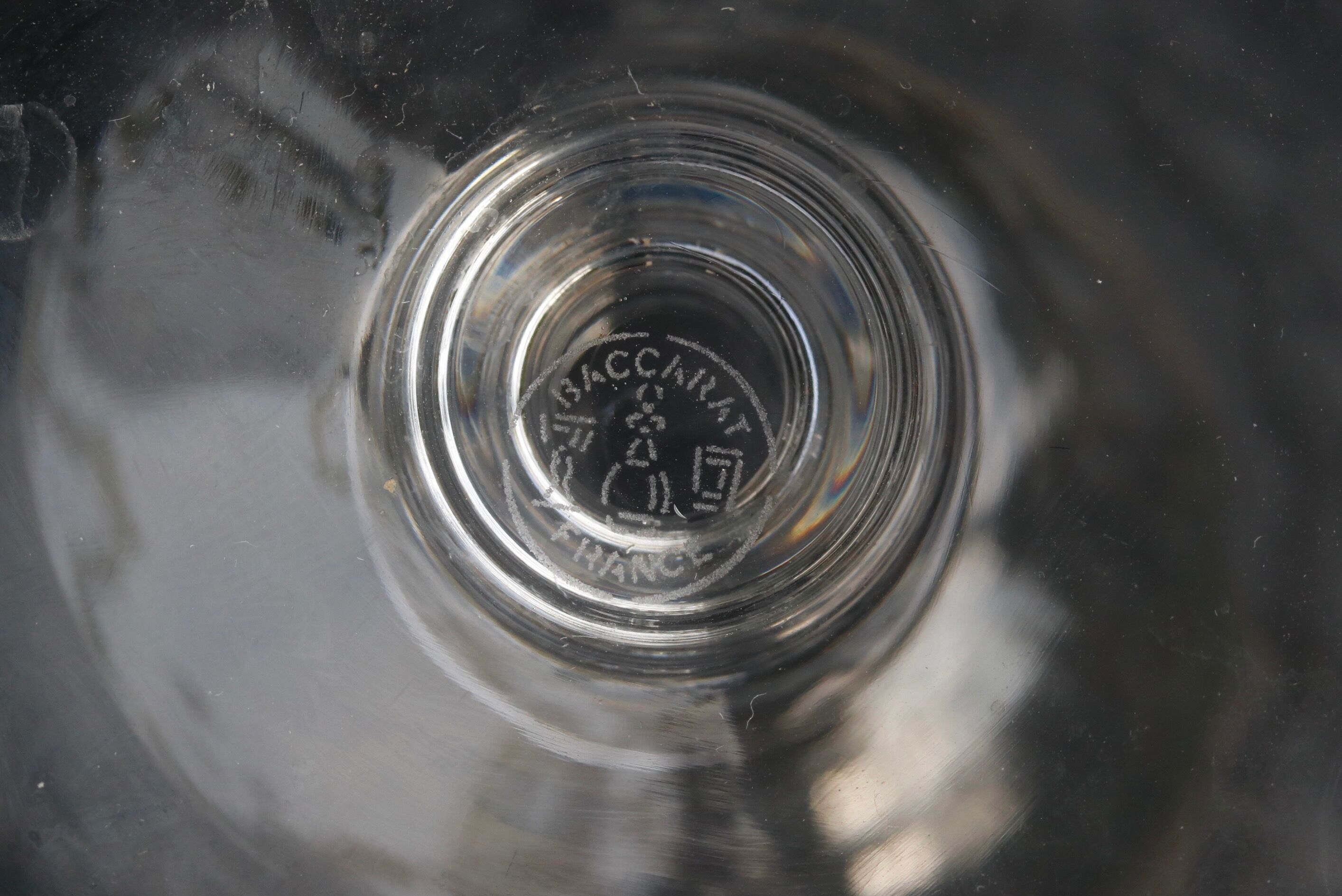 Suite of 6 Baccarat crystal water glasses with honeycomb patterns.