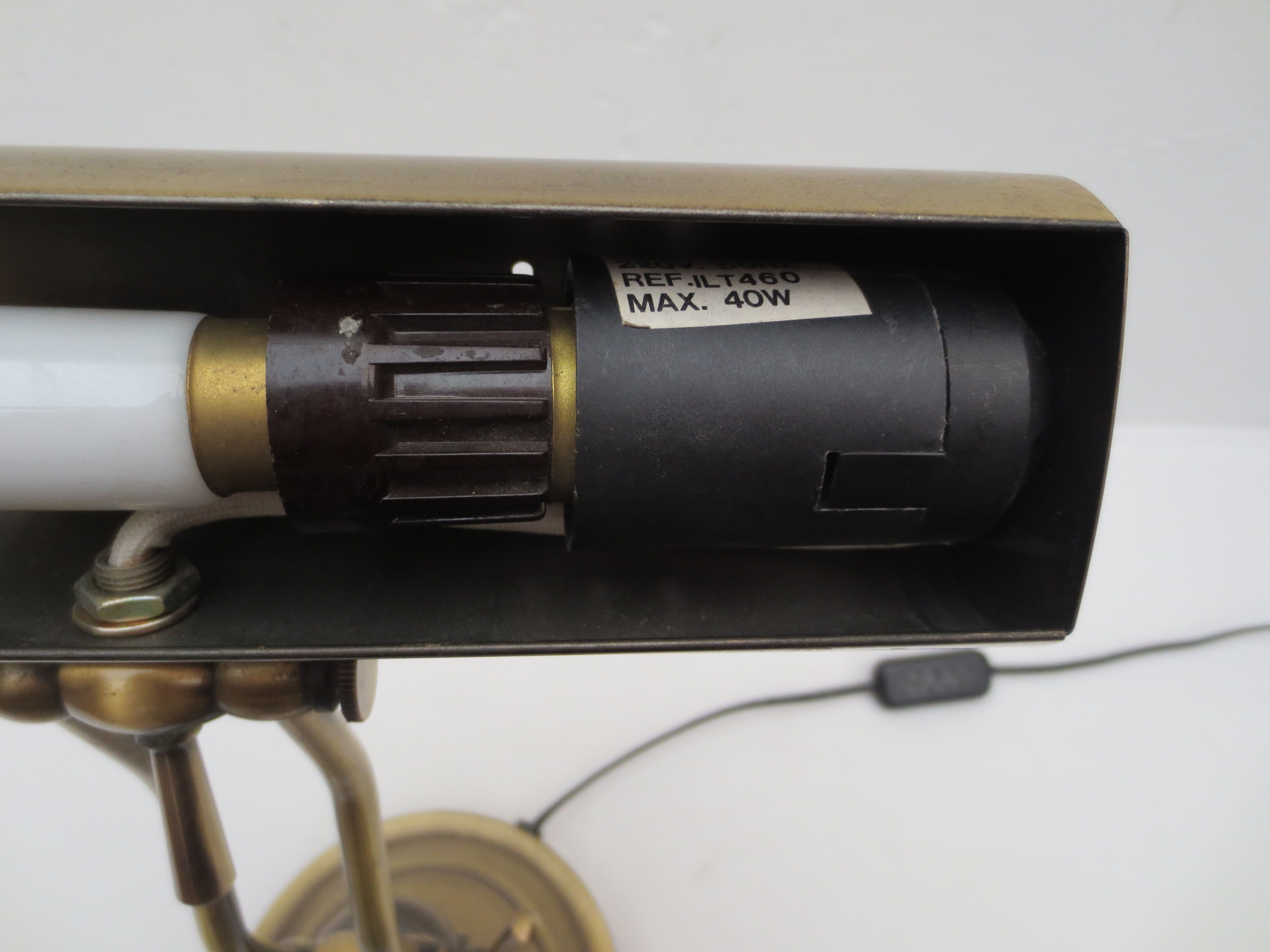 Old aged brass articulated desk lamp