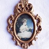 Medallion frame representing a little girl