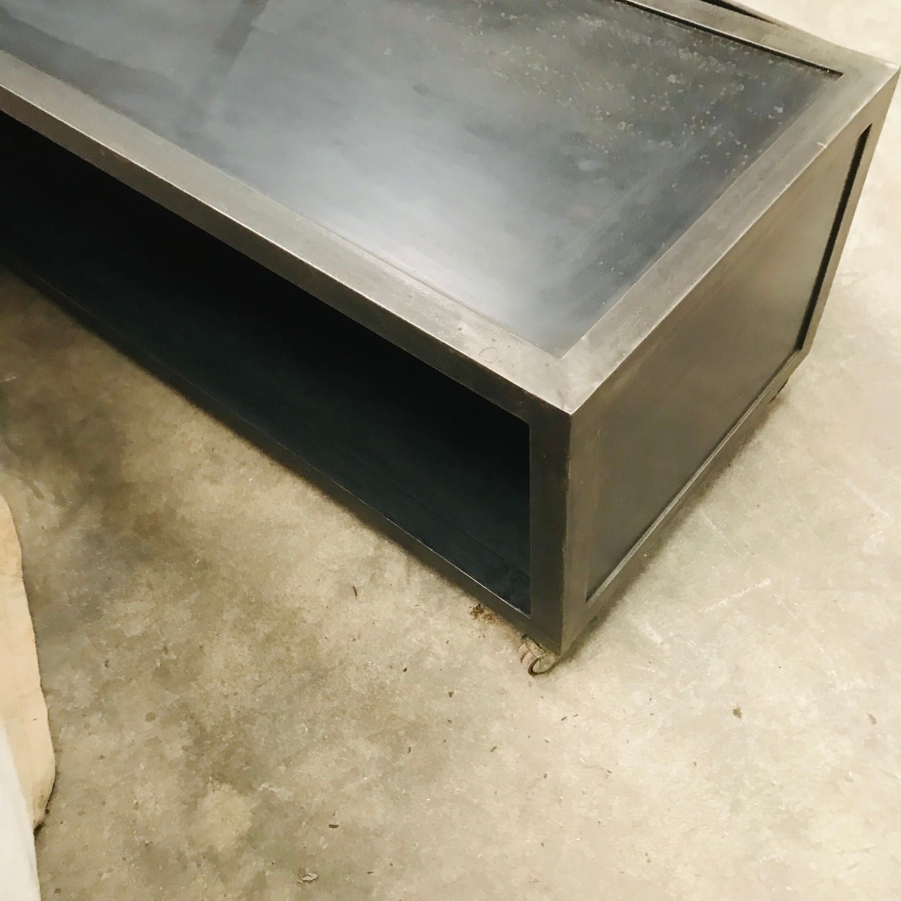 TV stand with natural steel accordion doors