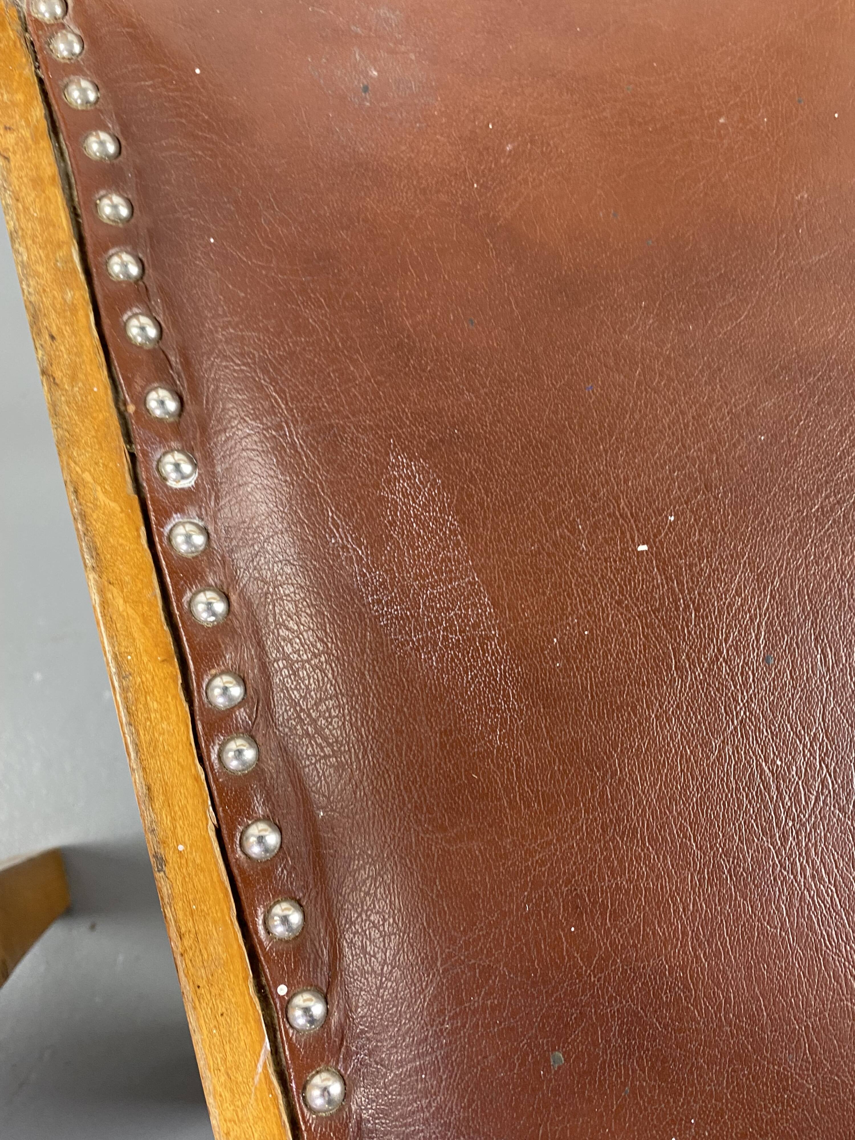 Pair of wooden and leather chairs